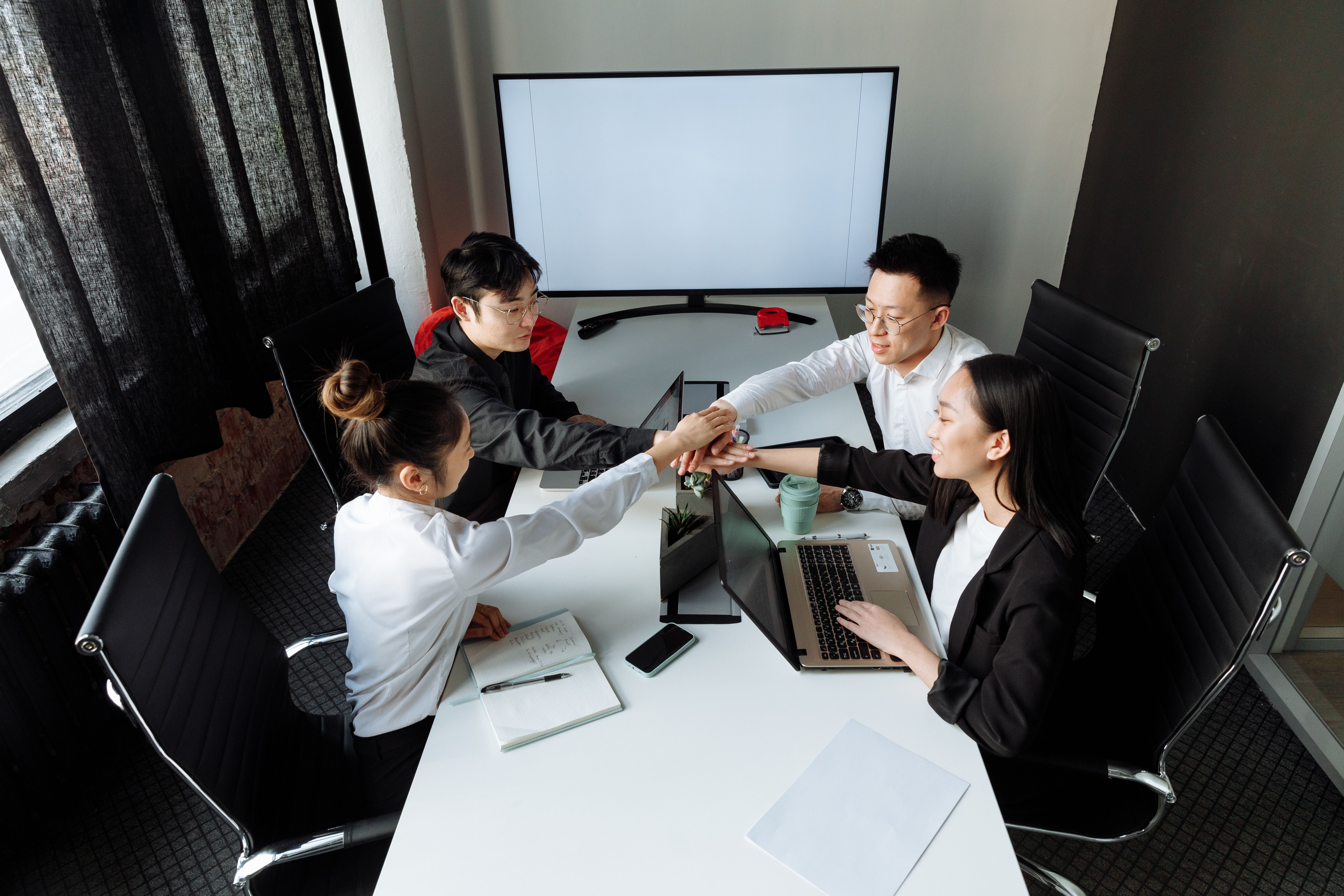 Asian business team collaborating in an office